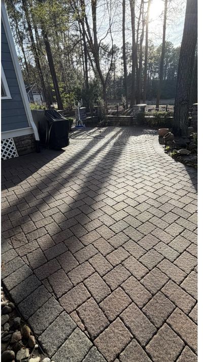 Same paver patio after cleaning, joints re-sanded and color restored