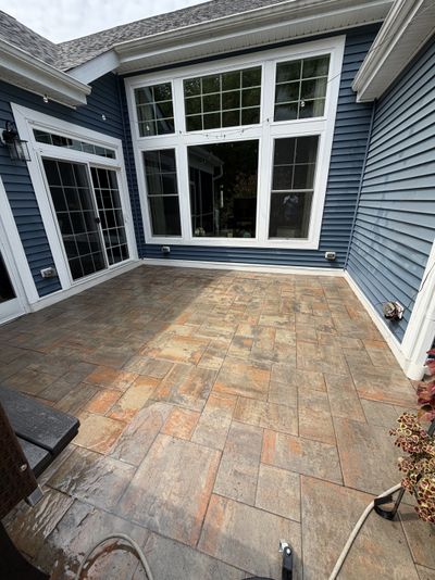 Same paver patio after cleaning, algae and moss removed, color restored